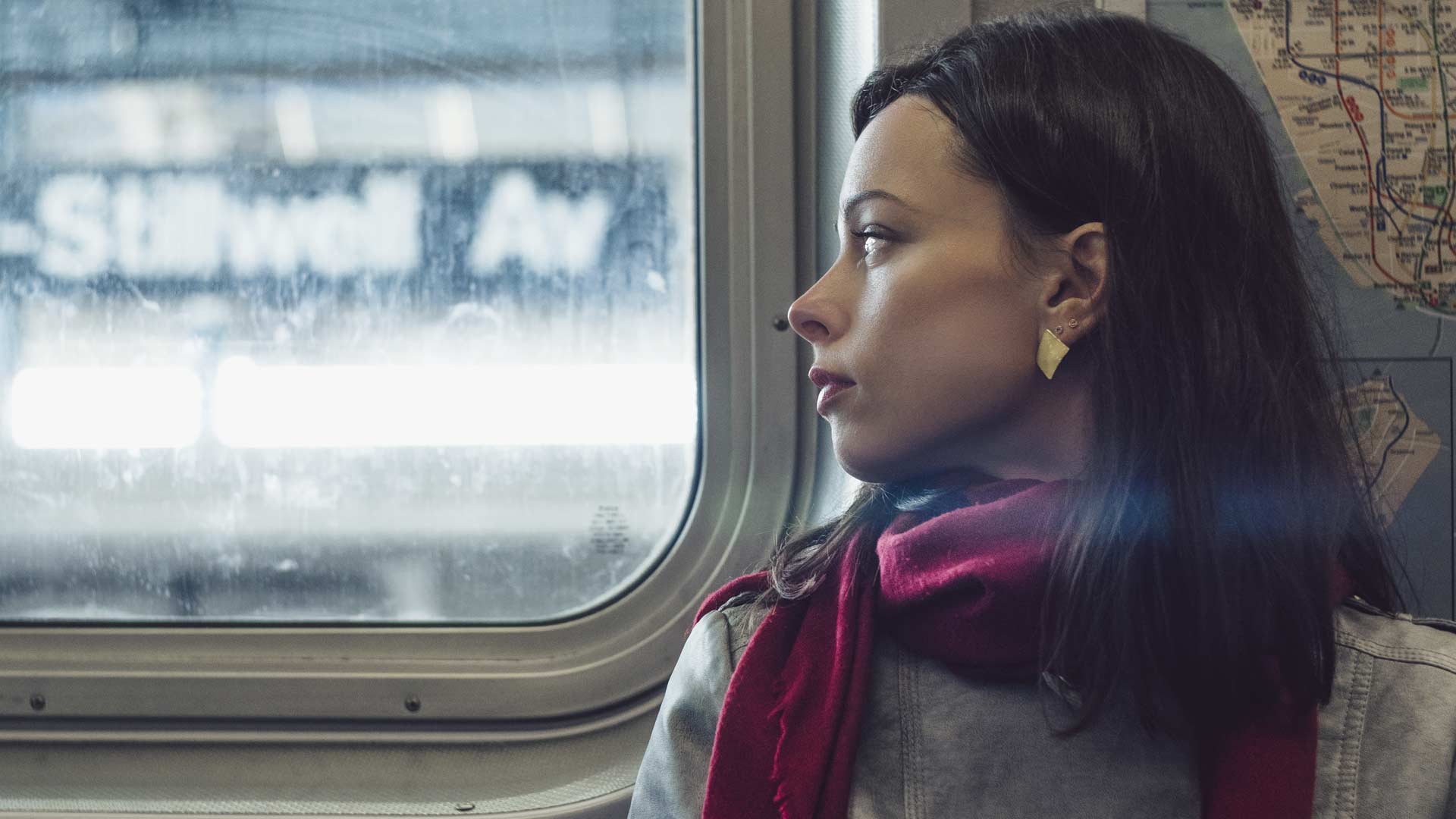 Woman riding the subway