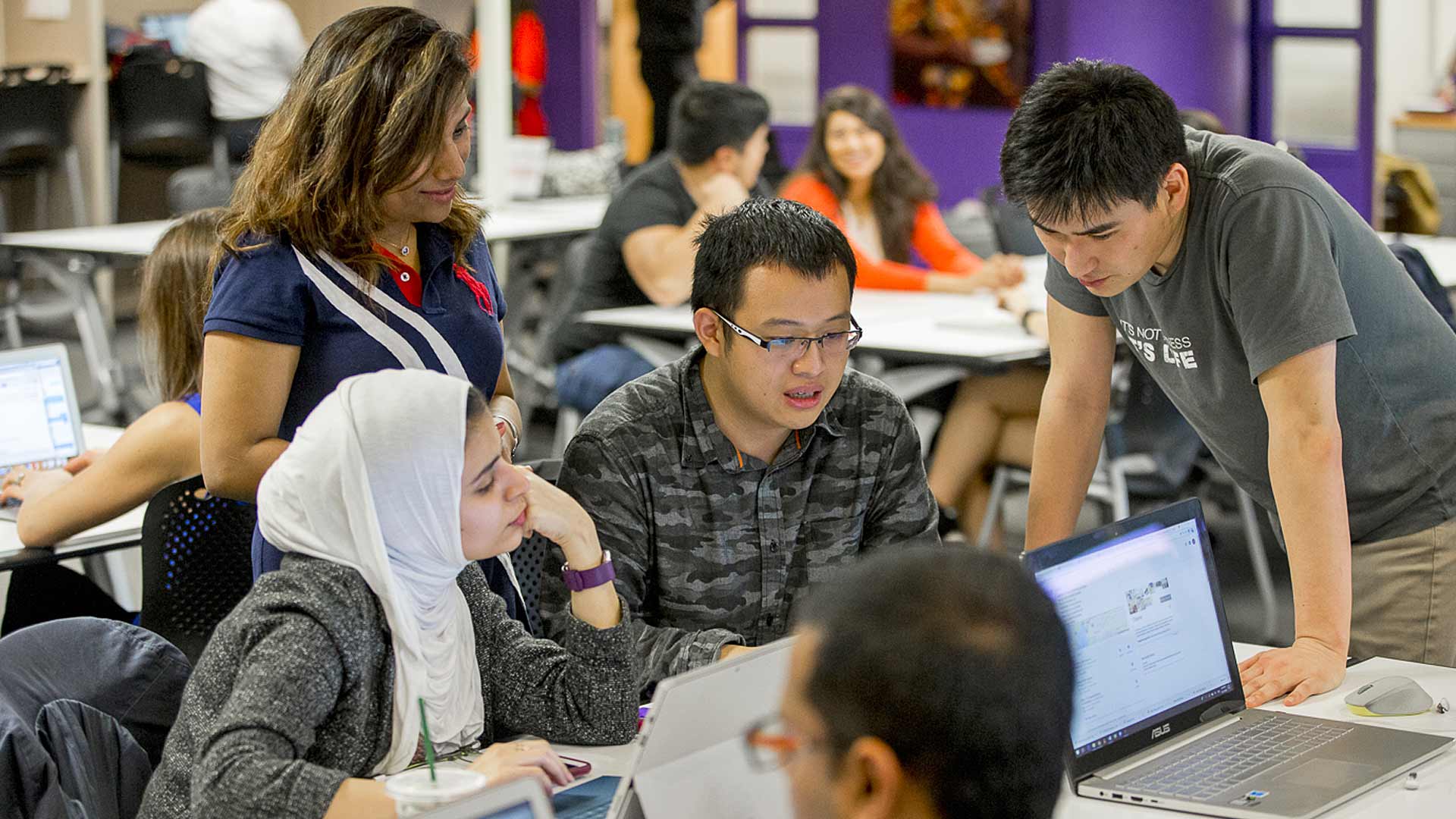 Students studying around a table