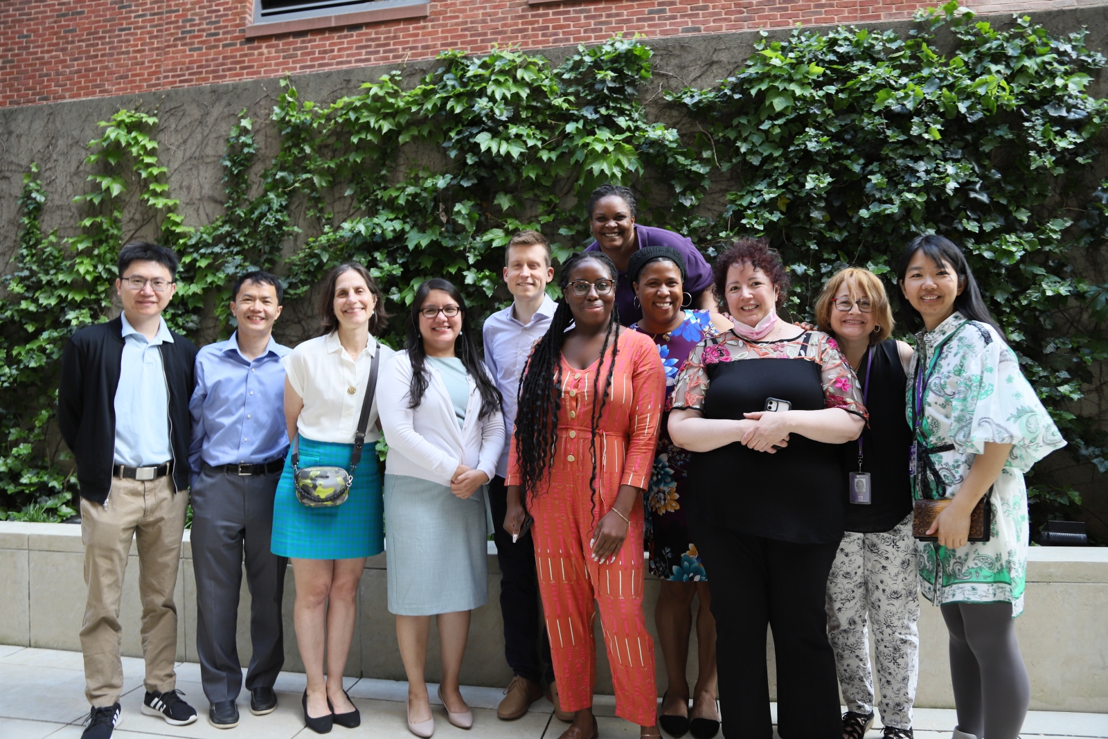 Photo of biostatistics faculty and staff at 2022 graduation reception