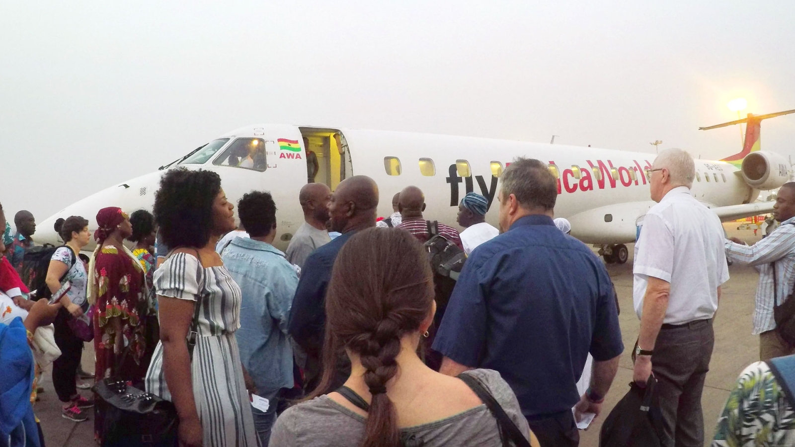 Students boarding a plane