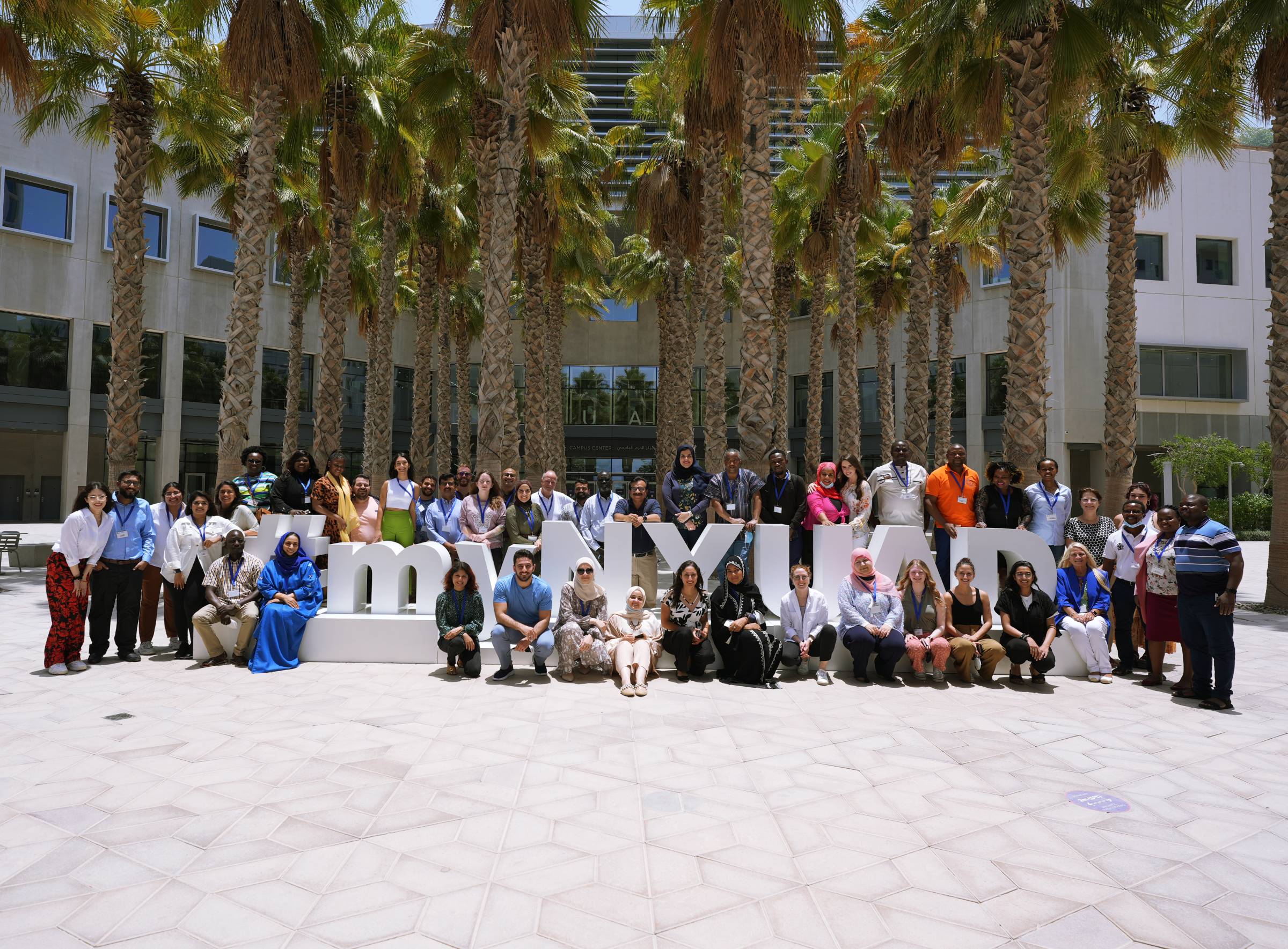 Participants and facilitators pose for a photo at the conclusion one the course. 