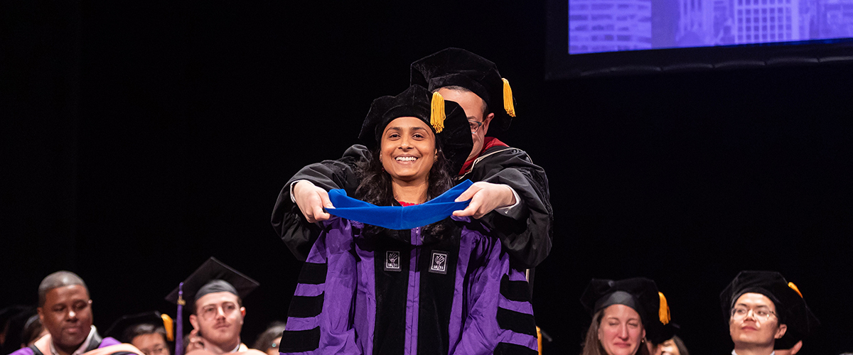 Avni Gupta being hooded by Dr. José Pagán