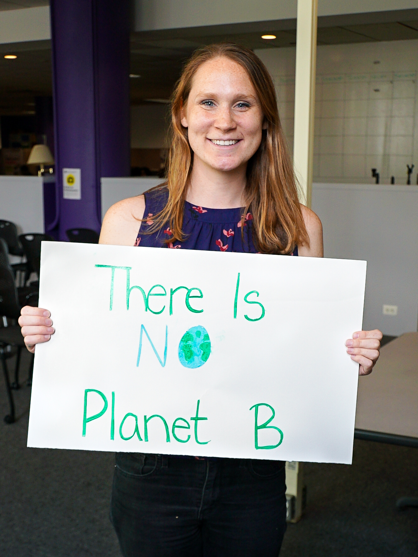 GPH Student holding "There is no planet B" poster