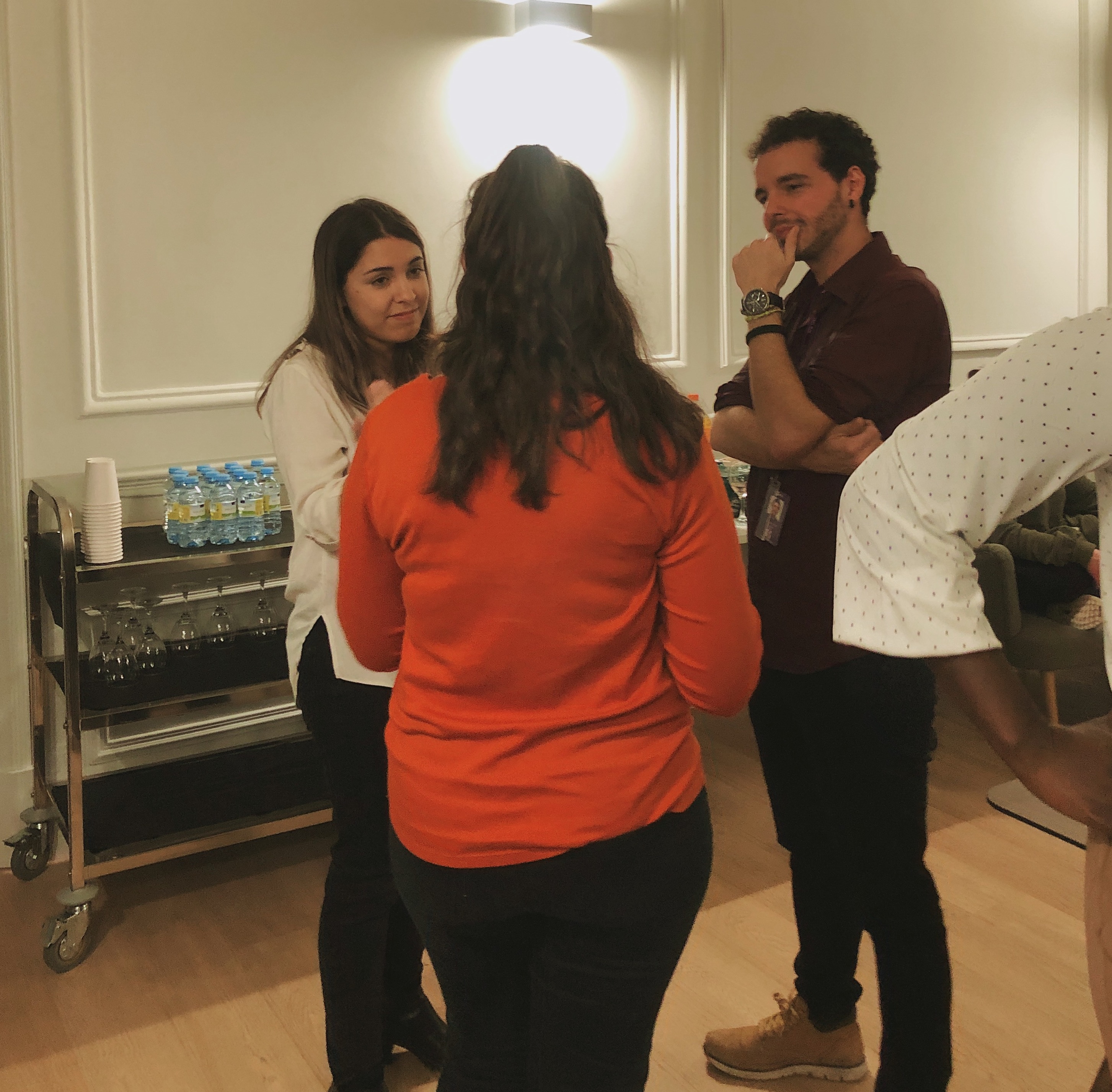 A student conversing with our Thesis professor, Julia Diez and Regression and Epi 3 professor, Pedro Gullón at the orientation reception with NYU Madrid staff and instructors