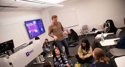 Daniel Fogal with classroom of students