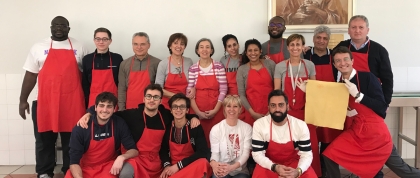 Opera San Francesco soup kitchen volunteers with GPH students and staff