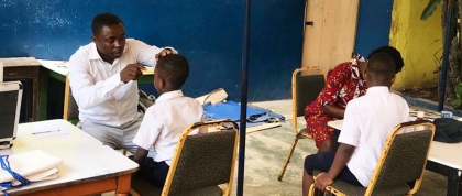 Health workers at a community health screening at a school in Accra, Ghana 