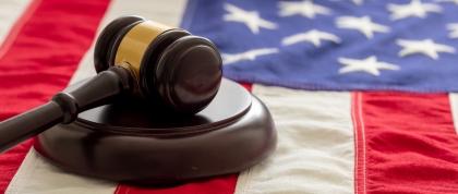 Law gavel on American flag