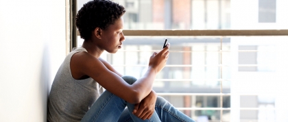 African American Woman using phone