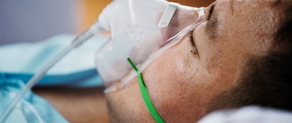 Sedated person receiving oxygen