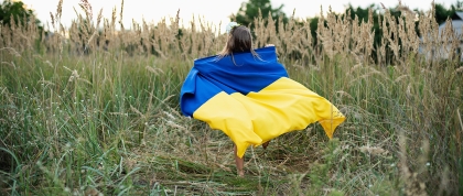 Ukrainian child with Ukrainian flag