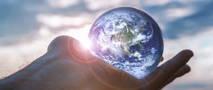 Earth in palm of a person's hand