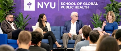 Panelists sitting on stage