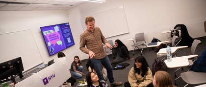 Daniel Fogal with classroom of students
